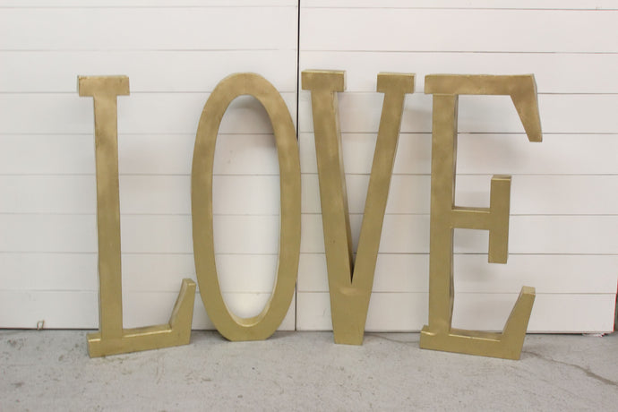 gold love sign rental